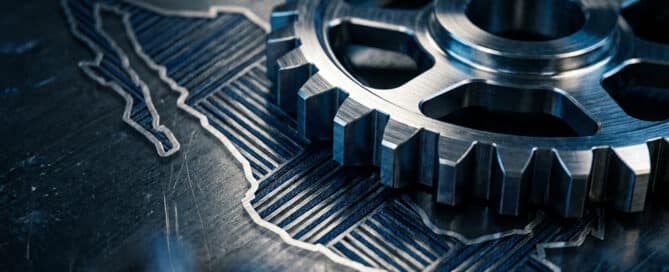 Precision-machined metallic component double-exposed with the stylized silhouette of Mexico, representing IMMEX and PROSEC manufacturing programs